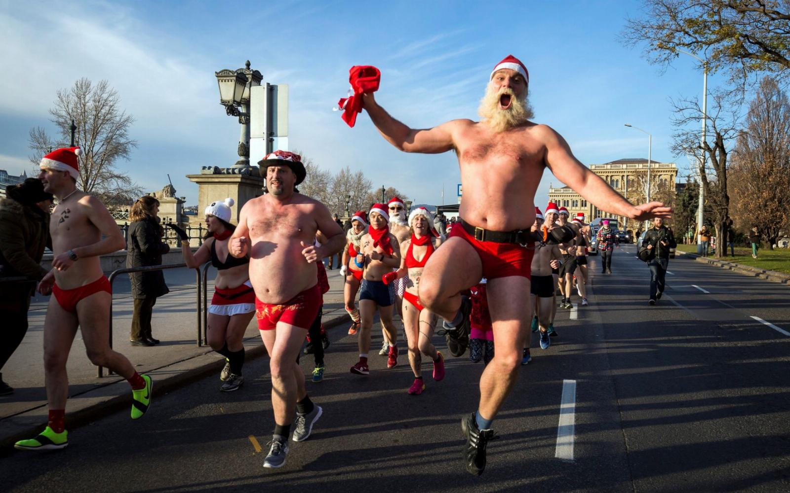 Watch: Half-Naked Hungarian Santas Run For Charity in Freezing Temperatures