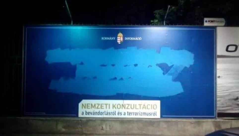 Hungarian Political Activists Deface Government Billboards