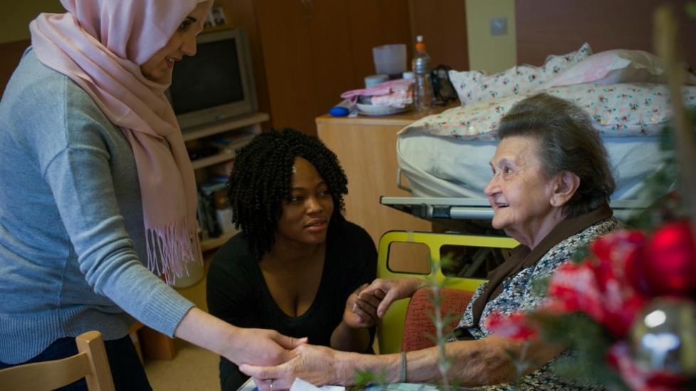Hungarian Elderly Help Refugees Find New Purpose